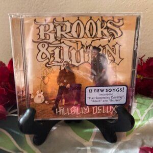 BROOKS AND DUNN MUSIC CD NEW UNOPENED, TORN CELLOPHANE